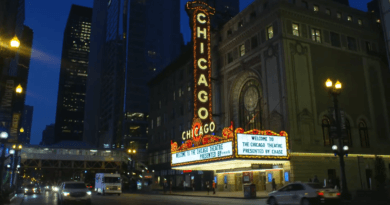 Chicago fall theater night: stage lights over a downtown house, with film-festival and Navy Pier season in the background.